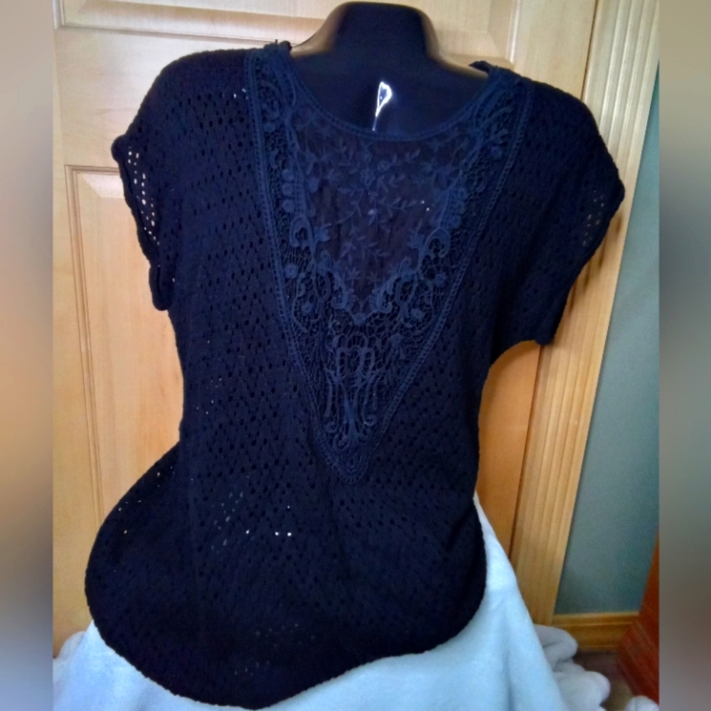 Women's  long open weave sweater with pretty v shaped lace front.